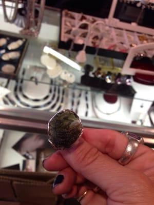 She has beautiful moldavite jewelry pieces like this ring for sale. Great prices! Great pieces!