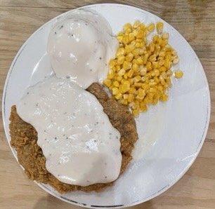 Chicken fried steak with gravy.