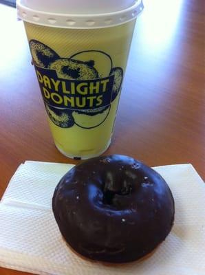 Chocolate covered cake donut and coffee