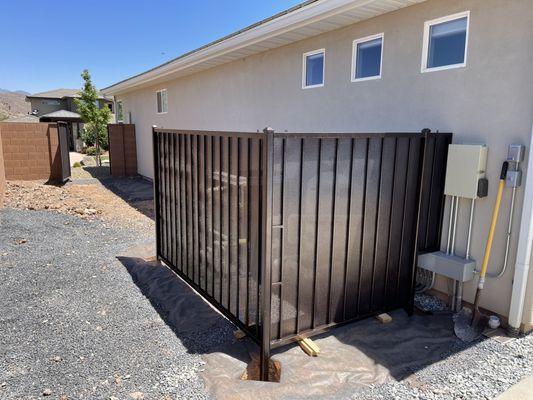 Pool equipment fence.