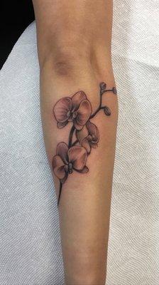 Forearm orchid tattoo