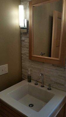 Half Bath remodel with tile wall and new pedestal sink