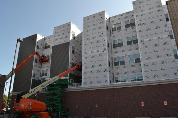 Our line of housewrap, Wraptor, being installed on a college university apartment complex in Illinois.