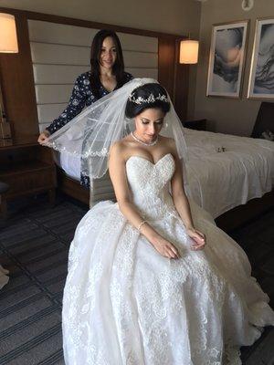 The most wonderful moment putting the veil on the queen of the day after finishing the hair and the makeup