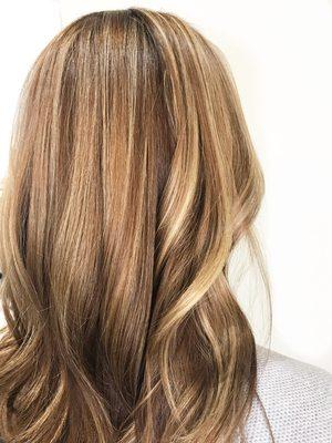 This client wanted that Jennifer Anniston inspired caramel brown with highlights.