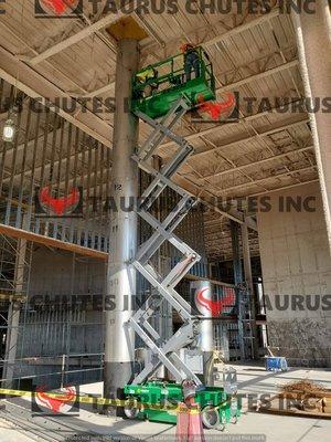 Our Boys working hard on the scissor lift