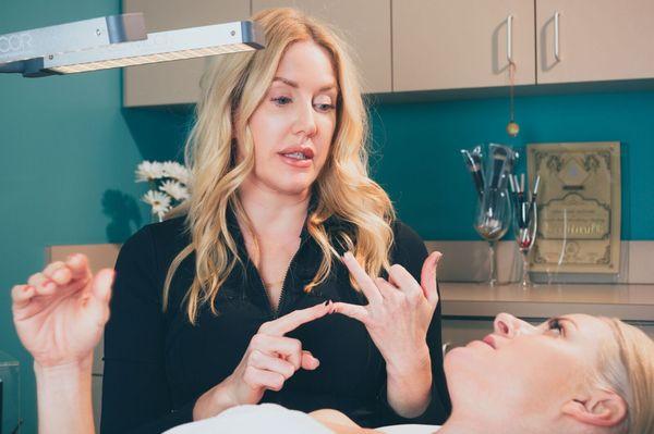 Dina Maynard, our master aesthetician.