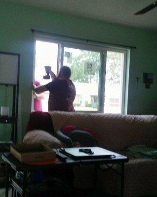 John and Justin installing living room window.