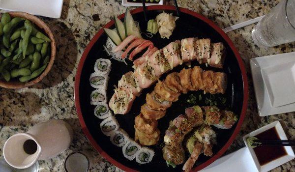 Kani (crab) sashimi atop cucumber slices. $13 for those four tiny strips. :-( Rolls were tasty!