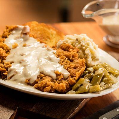 Country fried steak: Hand-breaded on Texas toast with gravy. Served with mashed potatoes and southern green beans.