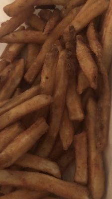 Delicious seasoned French fries.