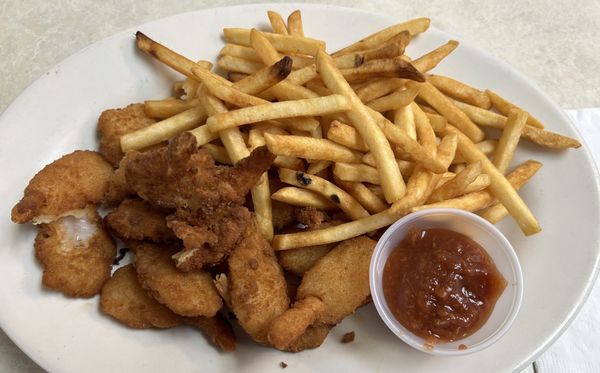 Fried shrimp and fries with cocktail sauce