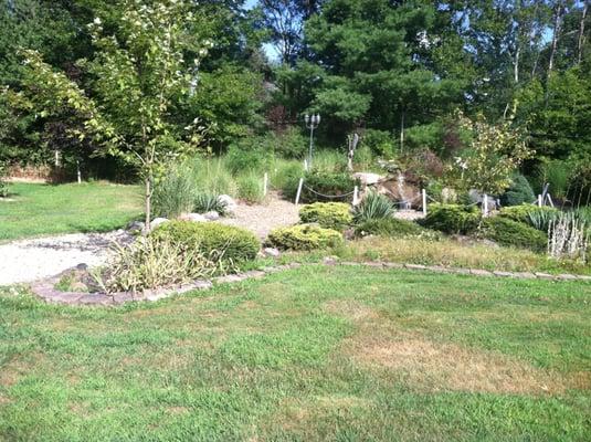 Garden towards front of facilties, with a fountain