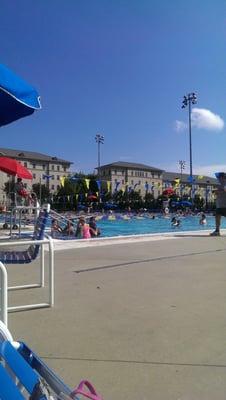 Large pool with lanes and diving board.