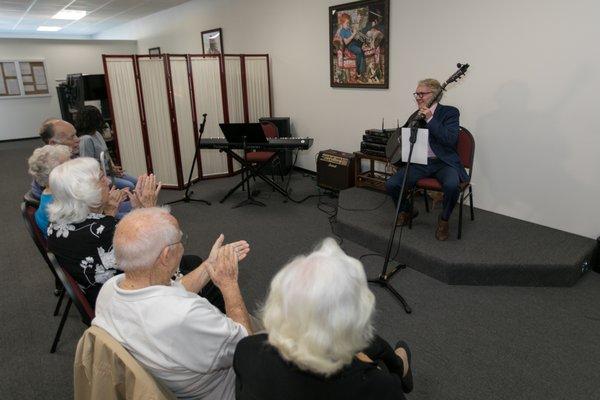 Here are some of our clients enjoying a music performance at our Social Club.