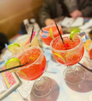 Strawberry margarita in the rocks with sugar rim