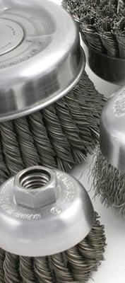 Wire cup brushes are used for finishing and deburring.  They are also used for removal of rust, paint or scale.