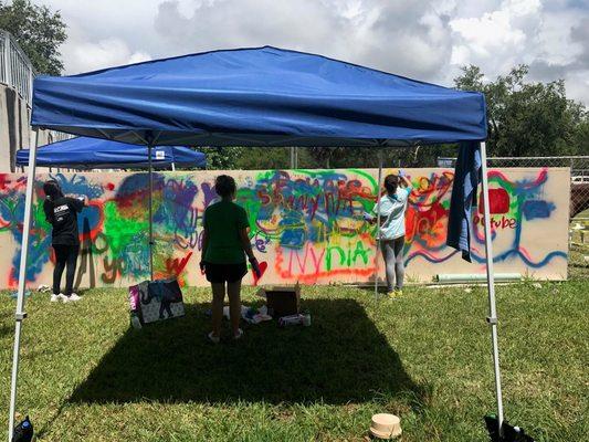 Youth express their feelings through graffiti wall during Bounce! trauma resolution program.