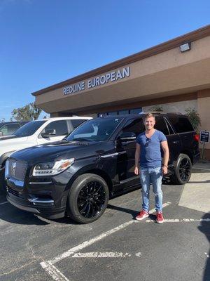 About to drive off in his brand new Navigator!!