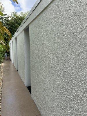 Stucco painting and pressure washed lanai floor.