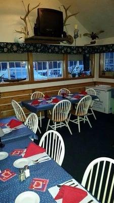 The dining area with bar for dinner & fun gatherings. They Cook AMAZING dinners! (this was set up for valentines dinner for us)