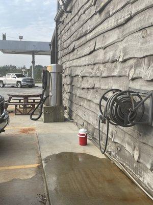 When I asked where I could fill my water jug, the cashier steered me to this hose on the right side of the building.