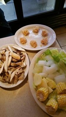 Housemade chicken meatballs, assorted mushroom plate, and assorted vegetable plate.