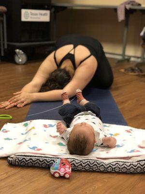 Stretching out the hips and low back in child's pose