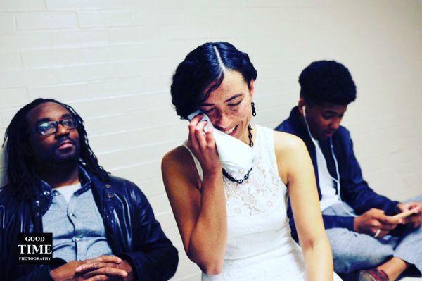 My beautiful and emotional bride at the city hall sitting with her son and her husband to be missing her father