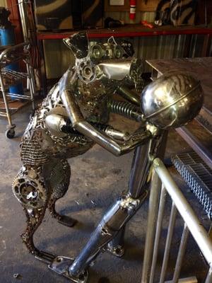 Puppy licking dog in the workshop-so detailed!