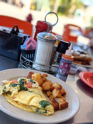 Spinach, Feta, Tomato omelette.  It was an average omelette, nothing out of the ordinary.  Fit my needs.