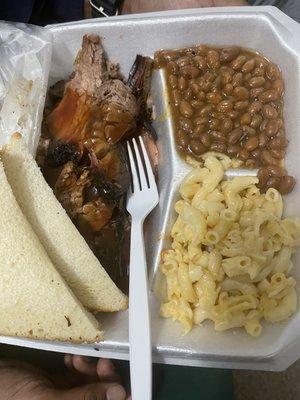 Brisket plate with mac and cheese and beans.