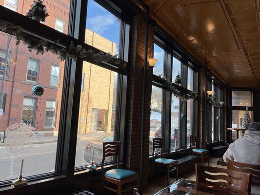 Lots of windows for people watching while having a drink or lunch.