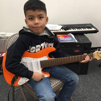 Angel 7 year old guitar student.