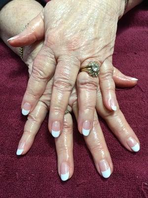 Natural nails with French Shelac. Will not harm natural nails and looks beautiful!