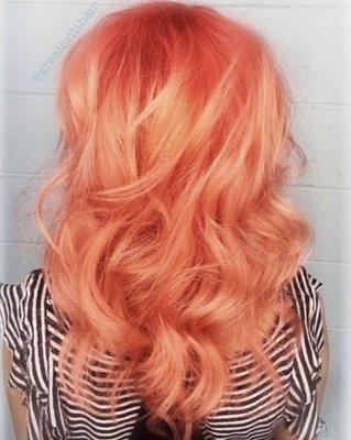 Bright coral hair color