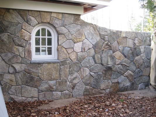 Our Flat Fieldstone full veneer used in a facade design.