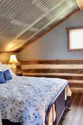 Upstairs bedroom in loft. Double bed.