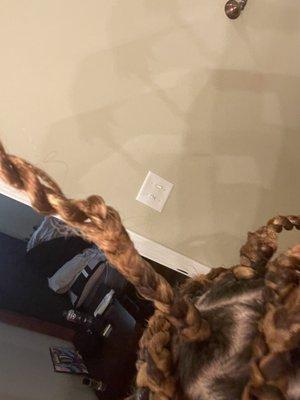 Hair coming out of twist along with twist not done properly