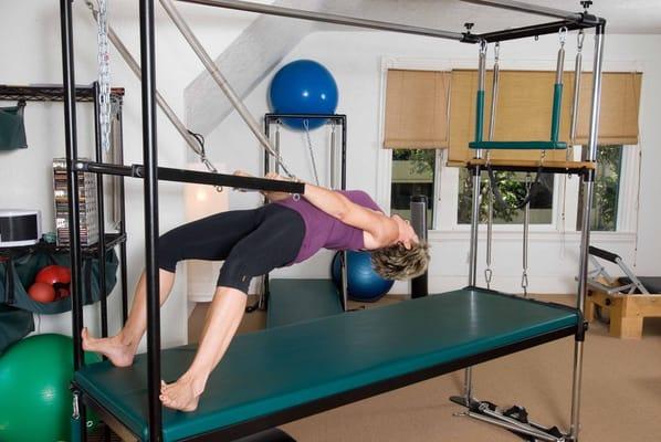 Pilates exercise enhancing leg strength and flexibility.