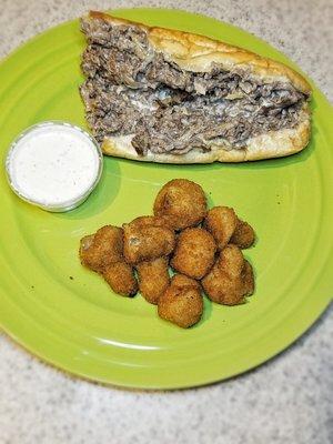 Half Philly Cheesesteak and Fried Mushrooms with Ranch dipping sauce