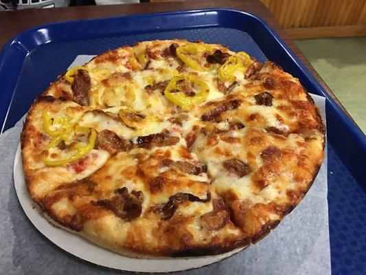 Bacon pizza with banana peppers