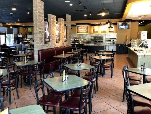 Spacious Dining Area, Counter with Visible Cooking Area, Salad Bar, and TV