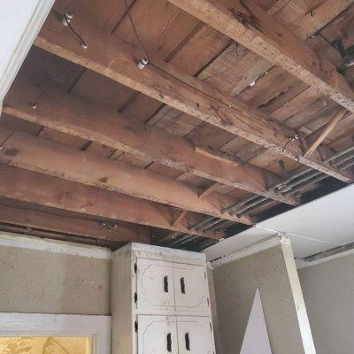 Demolition of water damaged ceiling