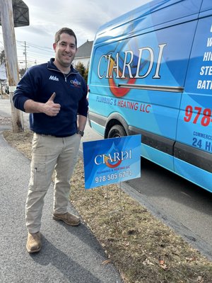 Owner Mike ciardi in front of his truck with the new yard signs!