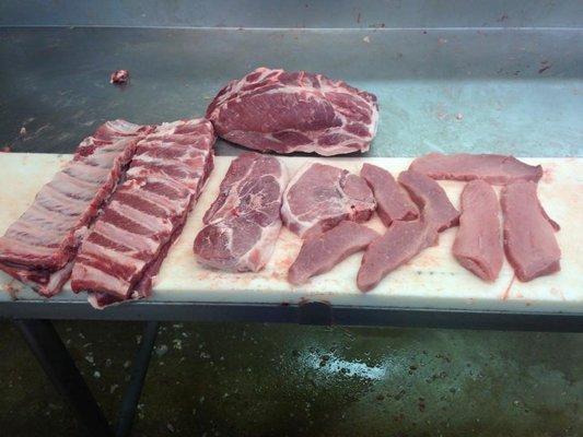 Primal pork cuts. Ribs , Boston butts & boneless pork chops.