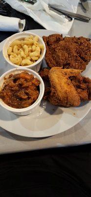 Fried chicken, yams and mac n cheese.