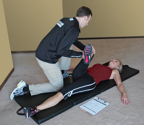 Finishing the workout with assisted stretching