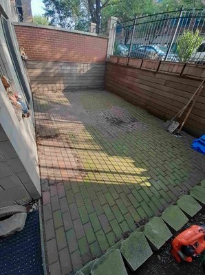 Before - brick patio paver restoration. Paver patios: low maintenance, enhance curb appeal, and are a great addition to any outdoor space.