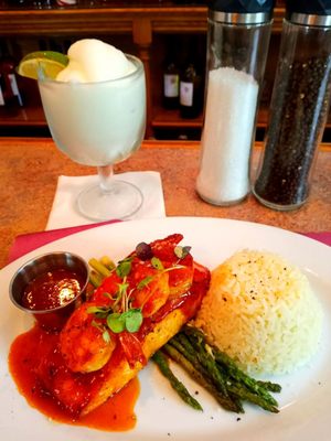 Seared Atlantic Salmon, topped with sautéed shrimp, and drizzled with bourbon Thai chili sauce. Of course the margarita as a refresher.